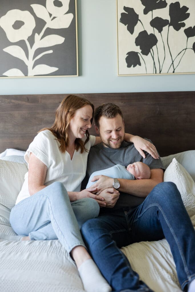 Natural lifestyle photo shoot with new parents and their newborn baby boy.