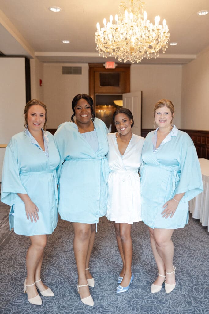 Bridesmaids in getting ready robes at the Pfister Hotel in Milwaukee.