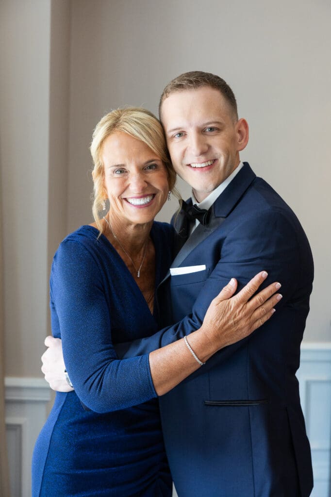 Mother of the Groom embracing her son on his wedding day. 