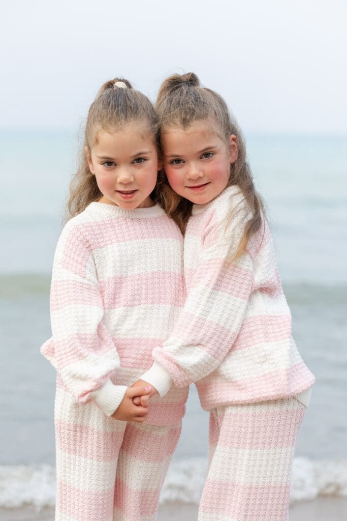 Two girls hugging each other