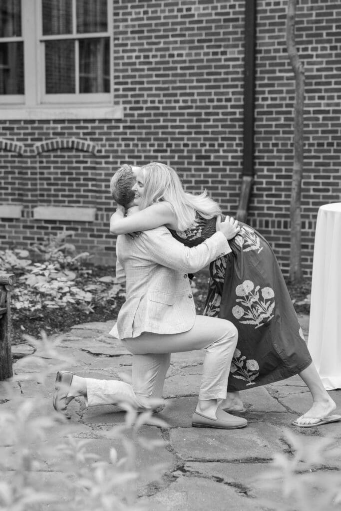 couple kissing after they got engaged