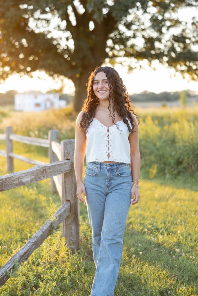 A Mequon senior session at the Nature Preserve. A young lady smiling at the camera.