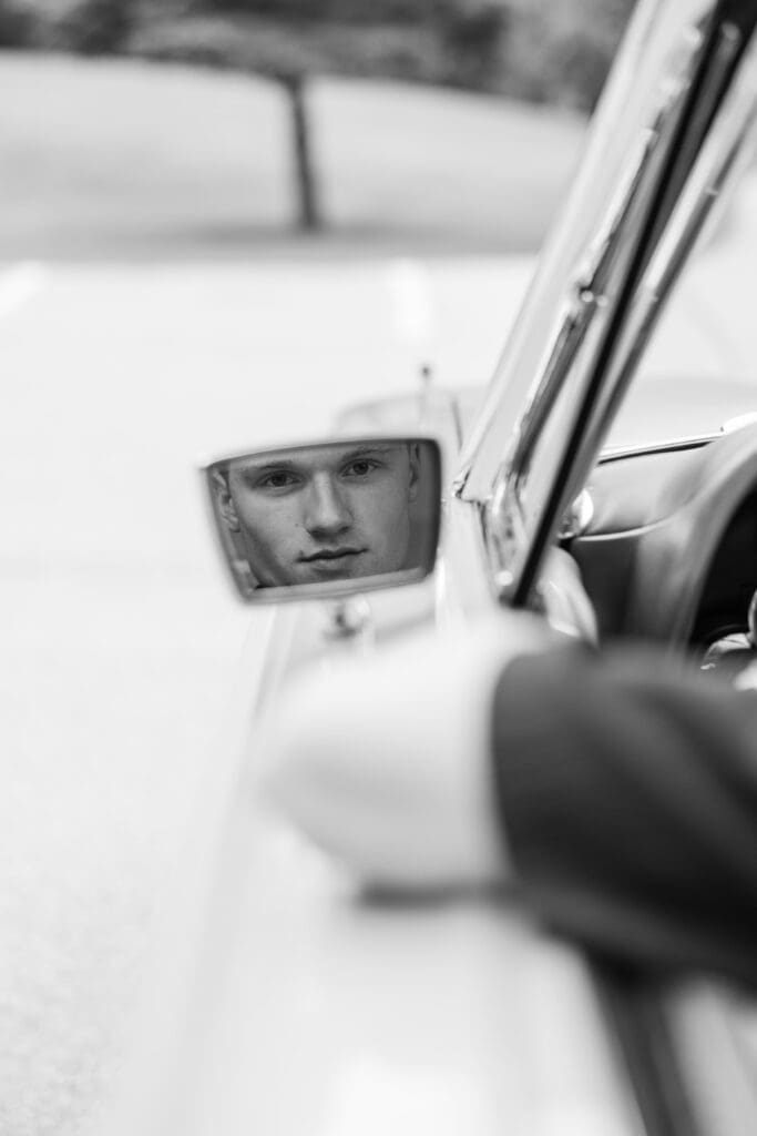 Face in a side mirror of a car.